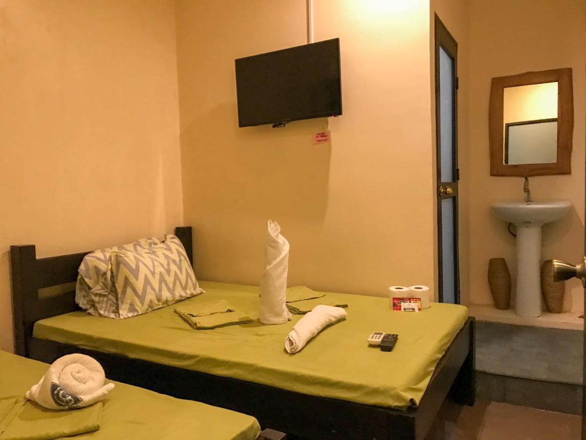 E.I. Suites Siquijor Bagian luar foto